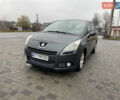 Серый Пежо 5008, объемом двигателя 1.6 л и пробегом 272 тыс. км за 7800 $, фото 1 на Automoto.ua