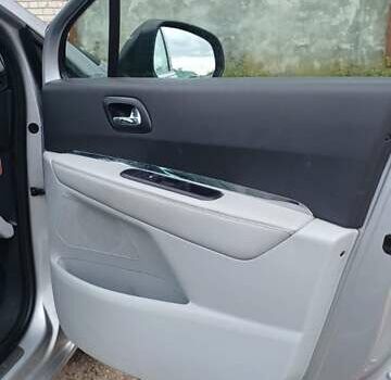 Серый Пежо 5008, объемом двигателя 1.6 л и пробегом 217 тыс. км за 9500 $, фото 10 на Automoto.ua