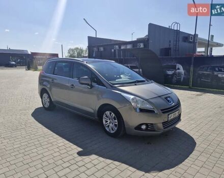 Серый Пежо 5008, объемом двигателя 1.6 л и пробегом 250 тыс. км за 8200 $, фото 1 на Automoto.ua