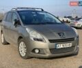 Серый Пежо 5008, объемом двигателя 1.6 л и пробегом 185 тыс. км за 6500 $, фото 1 на Automoto.ua
