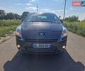 Серый Пежо 5008, объемом двигателя 1.6 л и пробегом 189 тыс. км за 8400 $, фото 1 на Automoto.ua