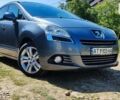 Серый Пежо 5008, объемом двигателя 1.6 л и пробегом 245 тыс. км за 7600 $, фото 1 на Automoto.ua