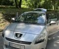 Серый Пежо 5008, объемом двигателя 1.6 л и пробегом 244 тыс. км за 8500 $, фото 1 на Automoto.ua