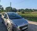 Серый Пежо 5008, объемом двигателя 1.6 л и пробегом 295 тыс. км за 9100 $, фото 1 на Automoto.ua