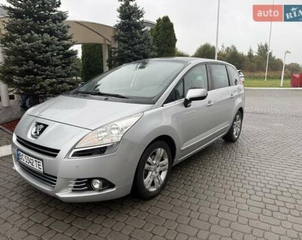Серый Пежо 5008, объемом двигателя 1.6 л и пробегом 267 тыс. км за 6900 $, фото 1 на Automoto.ua