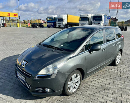 Серый Пежо 5008, объемом двигателя 1.6 л и пробегом 244 тыс. км за 6700 $, фото 1 на Automoto.ua