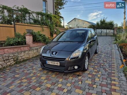 Серый Пежо 5008, объемом двигателя 1.6 л и пробегом 234 тыс. км за 7200 $, фото 1 на Automoto.ua