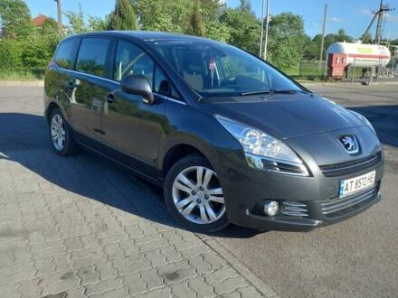 Серый Пежо 5008, объемом двигателя 1.6 л и пробегом 260 тыс. км за 7700 $, фото 1 на Automoto.ua