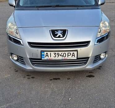 Серый Пежо 5008, объемом двигателя 1.6 л и пробегом 214 тыс. км за 6999 $, фото 1 на Automoto.ua