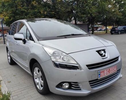 Серый Пежо 5008, объемом двигателя 1.6 л и пробегом 165 тыс. км за 7300 $, фото 1 на Automoto.ua