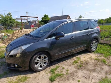 Серый Пежо 5008, объемом двигателя 1.6 л и пробегом 270 тыс. км за 8300 $, фото 1 на Automoto.ua