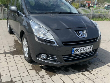 Серый Пежо 5008, объемом двигателя 2 л и пробегом 318 тыс. км за 8150 $, фото 1 на Automoto.ua