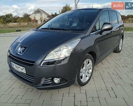 Серый Пежо 5008, объемом двигателя 1.56 л и пробегом 256 тыс. км за 7800 $, фото 1 на Automoto.ua