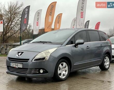Серый Пежо 5008, объемом двигателя 1.6 л и пробегом 276 тыс. км за 7999 $, фото 1 на Automoto.ua
