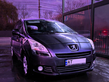 Серый Пежо 5008, объемом двигателя 1.6 л и пробегом 253 тыс. км за 7500 $, фото 1 на Automoto.ua