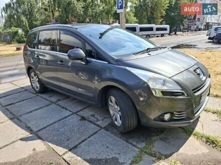 Серый Пежо 5008, объемом двигателя 1.6 л и пробегом 250 тыс. км за 8500 $, фото 1 на Automoto.ua