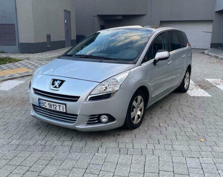 Серый Пежо 5008, объемом двигателя 1.6 л и пробегом 230 тыс. км за 9500 $, фото 1 на Automoto.ua