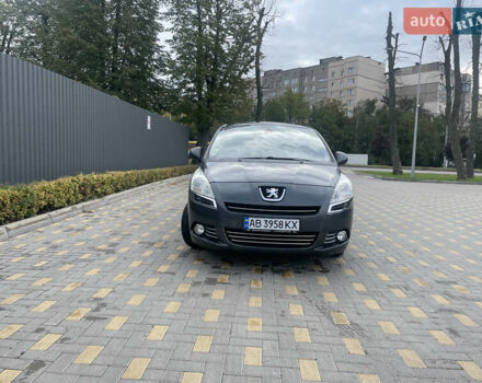 Серый Пежо 5008, объемом двигателя 1.6 л и пробегом 164 тыс. км за 7100 $, фото 1 на Automoto.ua