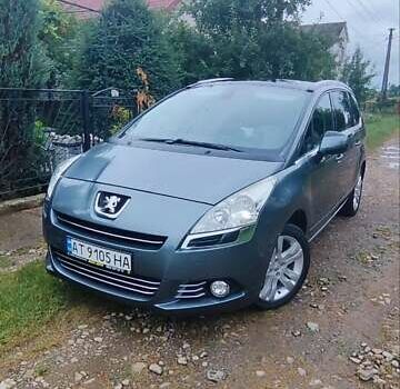 Серый Пежо 5008, объемом двигателя 1.6 л и пробегом 245 тыс. км за 7600 $, фото 1 на Automoto.ua