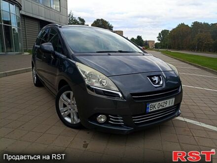 Серый Пежо 5008, объемом двигателя 1.6 л и пробегом 188 тыс. км за 7800 $, фото 1 на Automoto.ua