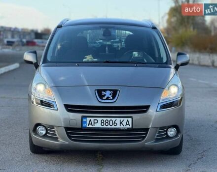 Серый Пежо 5008, объемом двигателя 1.6 л и пробегом 264 тыс. км за 8700 $, фото 1 на Automoto.ua