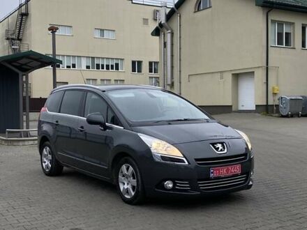 Серый Пежо 5008, объемом двигателя 1.6 л и пробегом 189 тыс. км за 8200 $, фото 1 на Automoto.ua