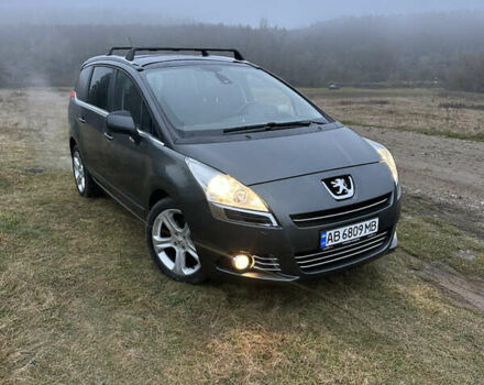 Серый Пежо 5008, объемом двигателя 1.6 л и пробегом 260 тыс. км за 8200 $, фото 1 на Automoto.ua