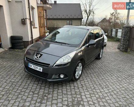 Серый Пежо 5008, объемом двигателя 2 л и пробегом 231 тыс. км за 9500 $, фото 1 на Automoto.ua