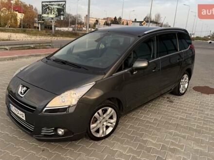 Серый Пежо 5008, объемом двигателя 2 л и пробегом 211 тыс. км за 10699 $, фото 1 на Automoto.ua