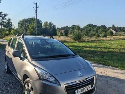 Серый Пежо 5008, объемом двигателя 1.6 л и пробегом 295 тыс. км за 9100 $, фото 1 на Automoto.ua