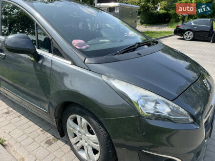 Серый Пежо 5008, объемом двигателя 1.6 л и пробегом 267 тыс. км за 9800 $, фото 1 на Automoto.ua