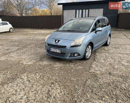 Синий Пежо 5008, объемом двигателя 1.6 л и пробегом 228 тыс. км за 7400 $, фото 1 на Automoto.ua