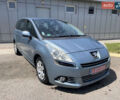 Синий Пежо 5008, объемом двигателя 1.6 л и пробегом 251 тыс. км за 7199 $, фото 1 на Automoto.ua