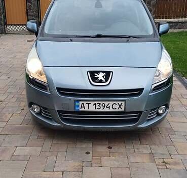 Синий Пежо 5008, объемом двигателя 1.6 л и пробегом 286 тыс. км за 7200 $, фото 1 на Automoto.ua