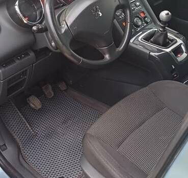 Синий Пежо 5008, объемом двигателя 1.6 л и пробегом 286 тыс. км за 7200 $, фото 5 на Automoto.ua