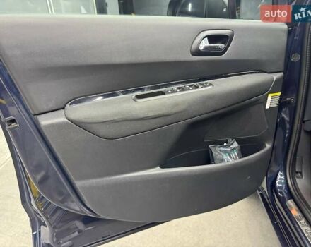 Синий Пежо 5008, объемом двигателя 1.56 л и пробегом 264 тыс. км за 10700 $, фото 11 на Automoto.ua