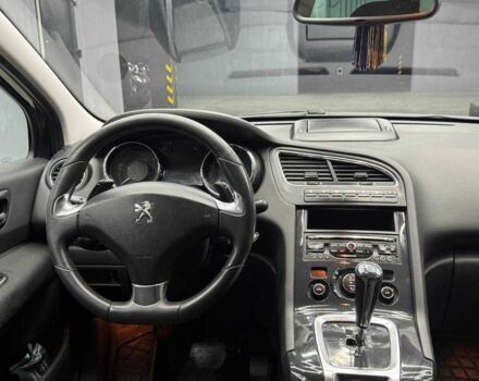 Синий Пежо 5008, объемом двигателя 1.6 л и пробегом 264 тыс. км за 10700 $, фото 10 на Automoto.ua