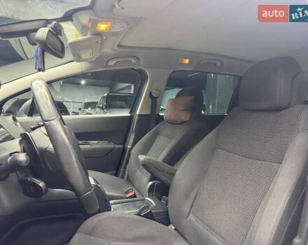 Синий Пежо 5008, объемом двигателя 1.56 л и пробегом 264 тыс. км за 10700 $, фото 7 на Automoto.ua