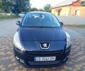Синий Пежо 5008, объемом двигателя 1.6 л и пробегом 257 тыс. км за 8200 $, фото 1 на Automoto.ua