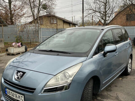 Синий Пежо 5008, объемом двигателя 1.6 л и пробегом 283 тыс. км за 7100 $, фото 1 на Automoto.ua