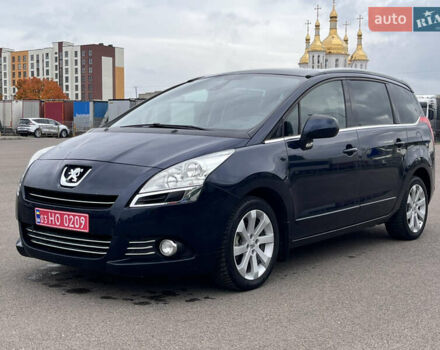 Синий Пежо 5008, объемом двигателя 1.6 л и пробегом 242 тыс. км за 6750 $, фото 1 на Automoto.ua