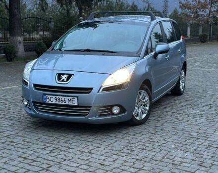 Синий Пежо 5008, объемом двигателя 2 л и пробегом 247 тыс. км за 6850 $, фото 1 на Automoto.ua
