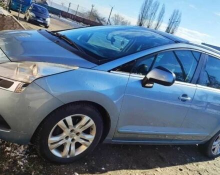 Синий Пежо 5008, объемом двигателя 1.6 л и пробегом 217 тыс. км за 7200 $, фото 1 на Automoto.ua