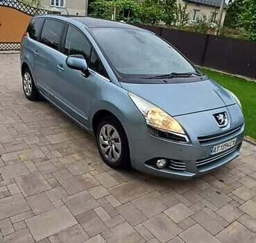 Синий Пежо 5008, объемом двигателя 1.6 л и пробегом 286 тыс. км за 7200 $, фото 1 на Automoto.ua