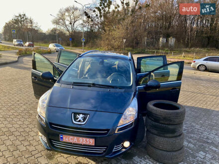 Синий Пежо 5008, объемом двигателя 1.6 л и пробегом 165 тыс. км за 8111 $, фото 1 на Automoto.ua
