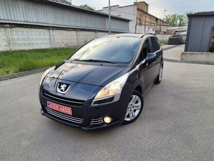 Синий Пежо 5008, объемом двигателя 2 л и пробегом 217 тыс. км за 11600 $, фото 1 на Automoto.ua