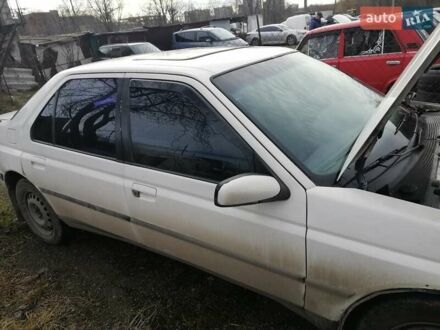 Белый Пежо 605, объемом двигателя 2 л и пробегом 196 тыс. км за 2100 $, фото 1 на Automoto.ua