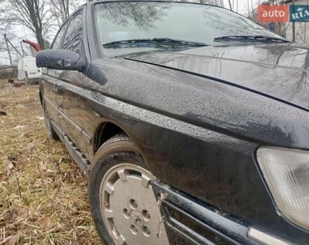 Черный Пежо 605, объемом двигателя 2 л и пробегом 400 тыс. км за 1350 $, фото 4 на Automoto.ua
