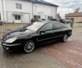 Черный Пежо 607, объемом двигателя 2.2 л и пробегом 291 тыс. км за 4175 $, фото 1 на Automoto.ua
