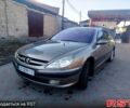 Серый Пежо 607, объемом двигателя 2 л и пробегом 280 тыс. км за 3600 $, фото 1 на Automoto.ua